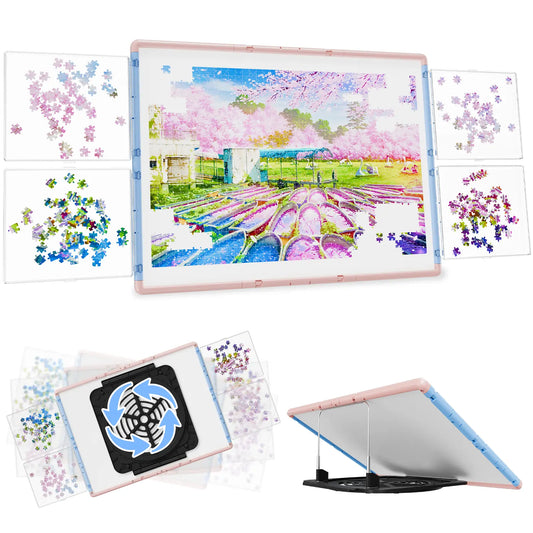 Bjpuzt 1000 piece revolving puzzle board in pink and blue, showing its four transparent sorting trays, 360-degree rotation, and adjustable tilt stand.